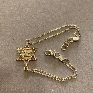 Gold tone star of david bracelet